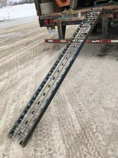 GRAVITY CONVEYING ROLLERS. 10' long x 12" wide material conveying rollers. Four available $120 each....