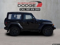 This Jeep Wrangler has a strong Regular Unleaded V-6 3.6 L/220 engine powering this Manual transmiss... (image 4)