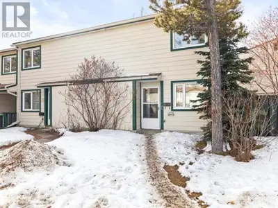 This updated 3-bedroom, 2-bathroom end unit with a fenced yard is ready for immediate possession. Id...
