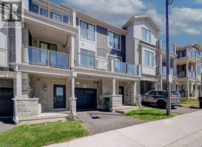 Welcome to this well-maintained stacked townhouse in the heart of Cambridge. This bright and functio...