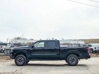 Heated Seats and Steering - Powerful 3.8L V6 engine with 4x4 capability - Advanced navigation system... (image 5)