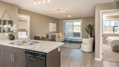 This freshly painted, clean, bright, open concept main floor 2 bed 2 bath is an open floorplan w/ove...