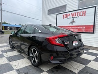 A well-equipped compact sedan with a refined interior, advanced tech features, and efficient turboch... (image 5)