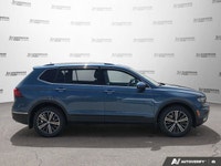 This Volkswagen Tiguan boasts a Intercooled Turbo Regular Unleaded I-4 2.0 L/121 engine powering thi... (image 6)