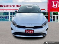 The 2024 Kia Forte EX, finished in striking Snow White Pearl, instantly elevates your daily commute... (image 8)