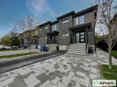 Sublime maison en rangée en coin située dans un quartier paisible, au cur du Plateau de la Capitale...