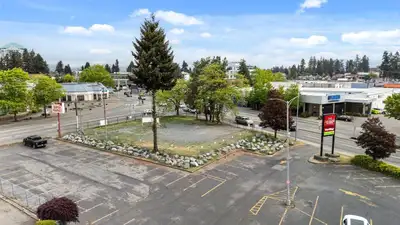 LOOK at this excellent Commercially Zoned Land Parcel, which has a major corner exposure fronting on...
