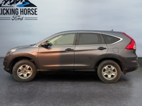Experience year-round confidence and everyday versatility in this 2016 Honda CR-V LX AWD. Powered by... (image 7)