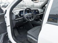 The 2026 Chevrolet Traverse LT AWD stands out in a bold White finish that complements its wide, athl... (image 7)