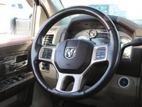 This 2014 Ram 3500 Longhorn is a local trade-in with two keys and lom km's, under the hood sits the... (image 3)