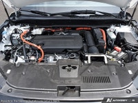 The 2026 Honda CR-V Hybrid EX-L AWD, dressed in a sophisticated white exterior and outfitted with a... (image 5)