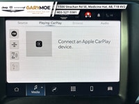 The 2022 Ram 1500 Classic SLT 4x4 Crew Cab stands out with its sophisticated gray exterior and power... (image 7)