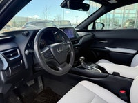 This 2024 Lexus UX 250h Premium presents a strong expression of its crossover qualities, with a bold... (image 7)