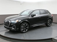 This Audi Q3 is equipped with heated front seats, dual climate control, Apple Carplay, blind-spot mo... (image 2)