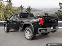 Delivering a colossal 470 horsepower and 975 lb-ft of torque, this 2024 GMC Sierra 3500HD SLT is pro... (image 2)