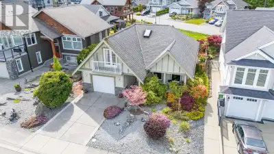 Carefully built custom home directly across from ocean access! The main level entry concept is not o...