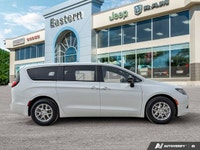 This Chrysler Grand Caravan has a trusty Regular Unleaded V-6 3.6 L/220 engine powering this Automat... (image 5)