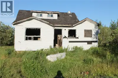 Welcome to Beaverbrook. Cross the tracks to this unique home on over 1 acre of land. Partially gutte...
