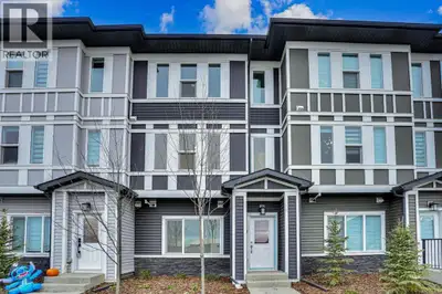 Welcome to your new home in the vibrant community of Belmont! This beautifully built townhouse combi...