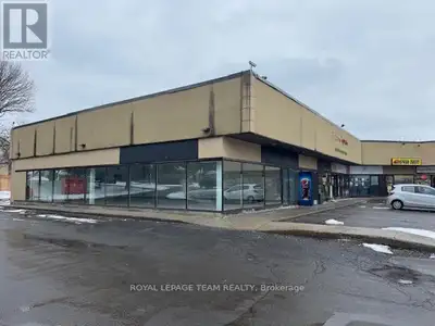 Rarely available in this plaza, 2000 sq ft retail end unit with exposure to two streets on a busy in...