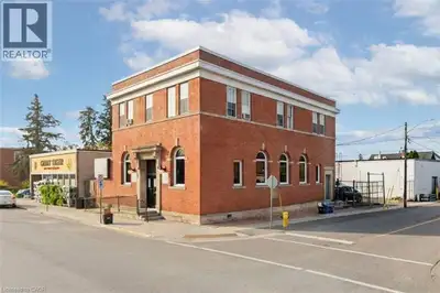 Prominent commercial building in the downtown core of Hagersville. This solid brick character buildi...