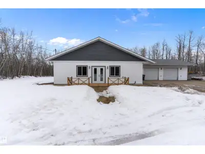 TOTALLY RENOVATED! This 1,756 sq. ft. 3-bedroom bungalow sits on a very private 2.92 acres in desira...
