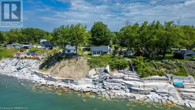 Escape to your peaceful waterfront sanctuary, a serene hideaway nestled against the stunning backdro...