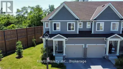 Immaculately maintained beautiful corner unit townhome with lots of Curb appeal, sitting on a ravine...