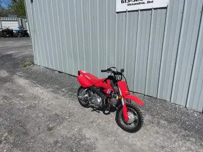 2026 Honda® CRF50FHonda CRF50F Trail Dirt Bike THE START OF ADVENTURE. Some are lucky enough to disc...