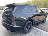 The 2026 Cadillac Vistiq 1SH, finished in elegant Stellar Black Metallic with a Jet Black interior,... (image 8)