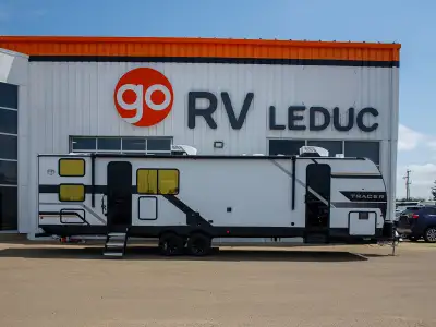 The 2027 Tracer 290QB is a spacious bunkhouse travel trailer designed with families in mind. It offe...