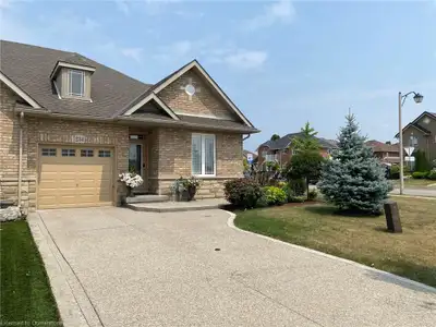 Gorgeous! Shows 10+++ This Freehold Bungalow (one story home) is an end unit on a huge premium lot....