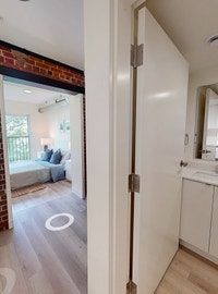 Modern and comfortable unit featuring: Stainless steel fridge Efficient heat pump Window coverings i... (image 4)