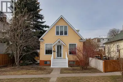 Welcome to this charming 1.5-storey home nestled on a quiet, beautiful tree-lined street in the hear...