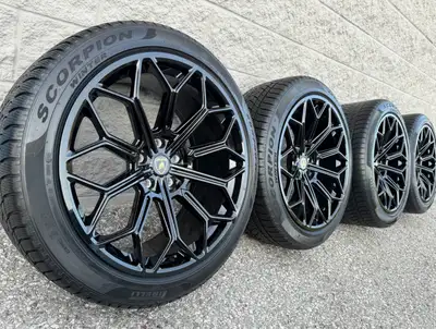 Pirelli Scorpion Winter Snow Tires and original 22 inch Lamborghini Urus staggered gloss black 'Auri...