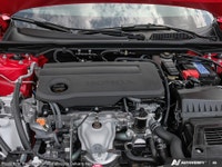 Introducing the stunning 2026 Honda Civic in an eye-catching red, designed to impress with its styli... (image 5)
