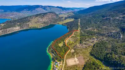 36 ACRES WITH SPECTACULAR VIEWS OF KALAMALKA LAKE! Surrounded by nature, overlooking the vibrant tur...