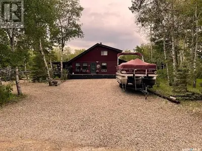 Cottage Features 1,990 sq. ft. | 4 Bedrooms | 2 Baths Main-floor bedroom, wood staircase to three up...