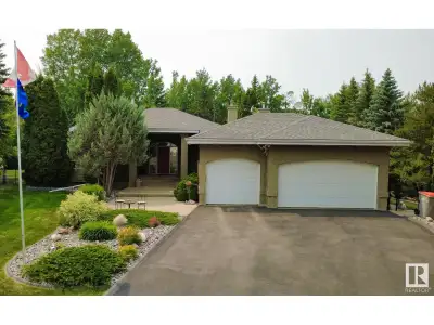 Private, peaceful country residential acreage minutes from Edmonton in prestigious Helenslea Heath....