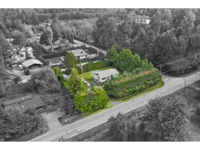 Coming to market for the first time in over 35 years! ½ acre corner property with home & impressive...