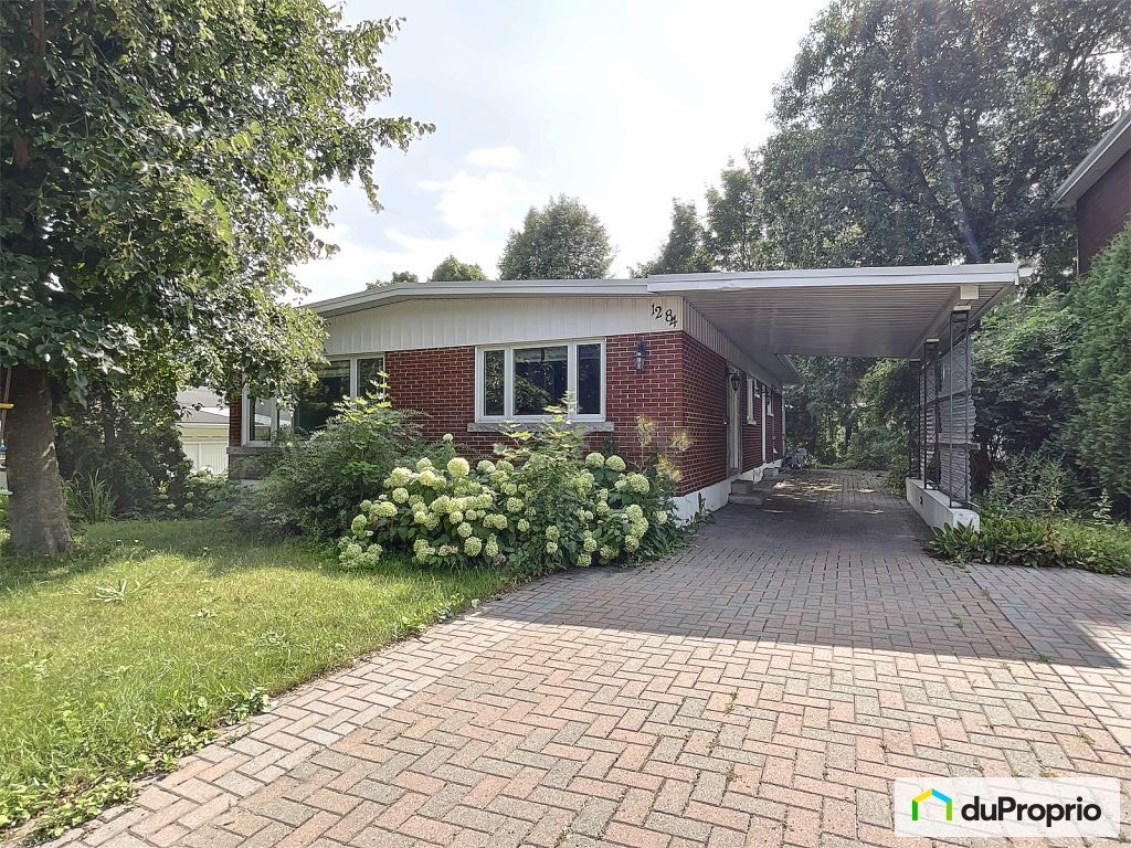 $650,000 - Bungalow for sale in Ste-Foy — photo 1