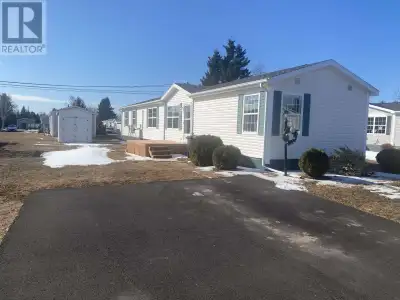 Recently renovated 3-bedroom, 2-bath mini home featuring a bright, spacious living room and a beauti...