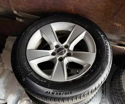 (4) Michelin 215 65 17 Snow Tires mounted on Dodge Charger Alloy rims. + 80 percent tread, rims are...