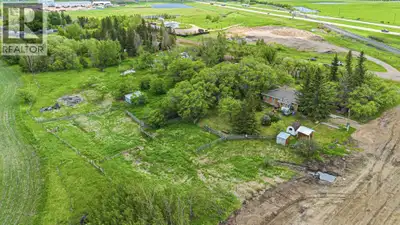 Situated on the outskirts of Lloydminster in the RM of Britannia, this well-treed 2.99-acre acreage...