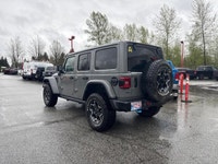 This 2022 Jeep Wrangler 4xe Unlimited Rubicon, in an attention-grabbing Sting-Grey, represents the p... (image 4)