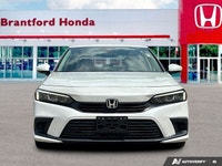 Drive with confidence and sophistication in this immaculate white 2022 Honda Civic Sedan LX. Experie... (image 9)
