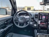 This Ram 1500 has a dependable Twin Turbo Premium Unleaded I-6 3.0 L/183 engine powering this Automa... (image 9)