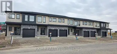 This stunning 3-bedroom modern townhouse in the heart of Woodstock, Ontario, where contemporary desi...