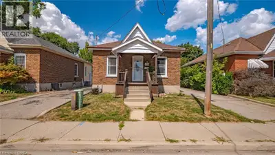 Charming Brick Bungalow with Detached Garage. Cute as a button and full of character, this 2-bedroom...