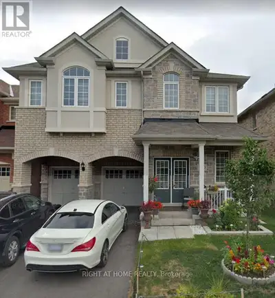 Spacious basement unit with ensuite laundry, kitchen, and separate entrance. The unit includes ample...